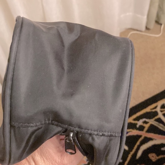 CHANEL TOILETRIES BAG. BLACK. CHANEL PRINTED IN RAISED LETTERS. HAS HANDLE. EUC - Picture 9 of 10